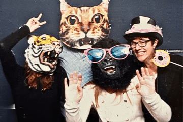 Image of 4 people with animal masks and Jane in a silly hat